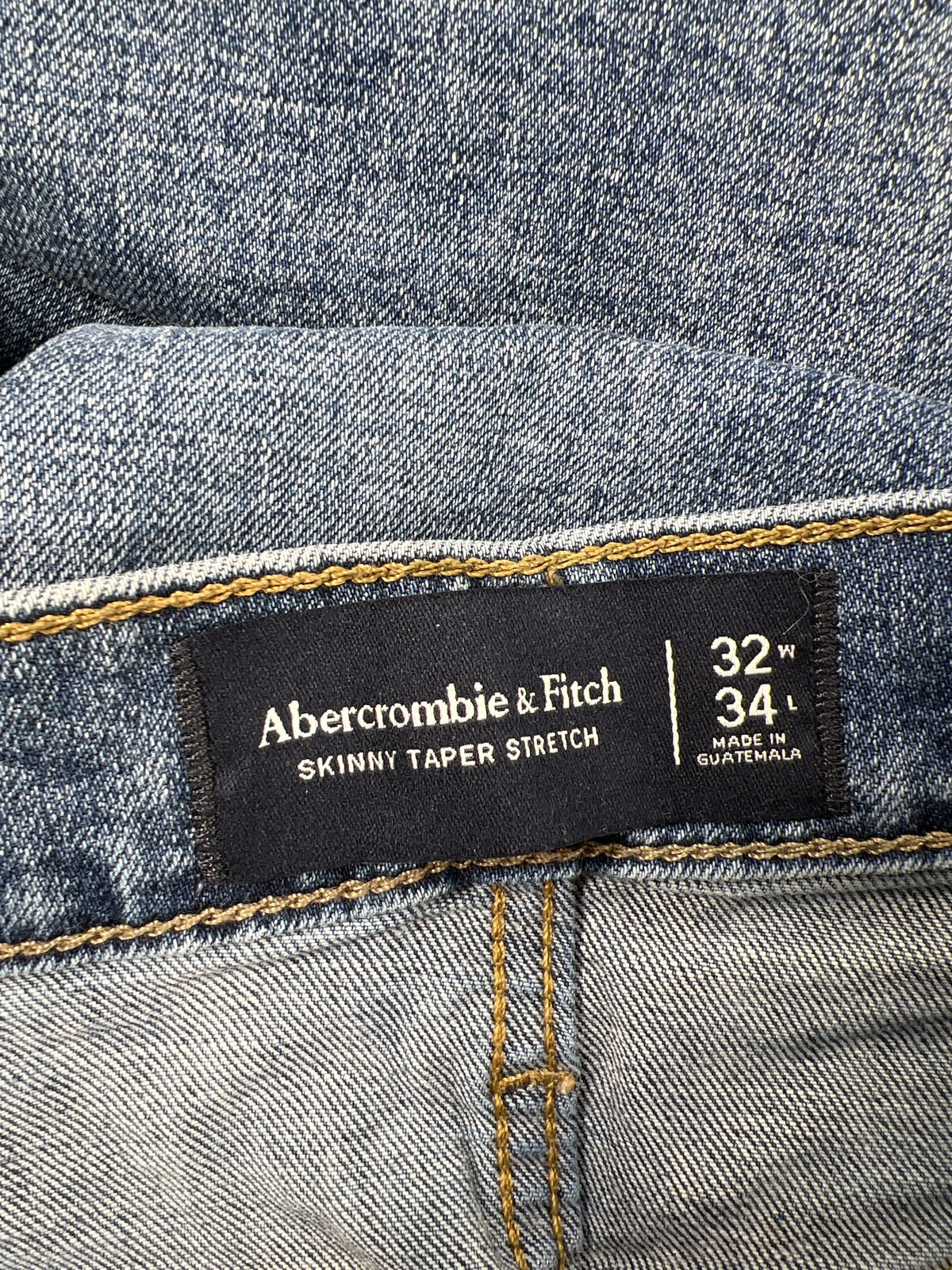 Abercrombie and Fitch Men’s Medium Wash Distressed Skinny Taper Jeans - 32x34